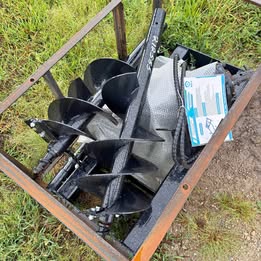 New AGT skid loader post hole auger set